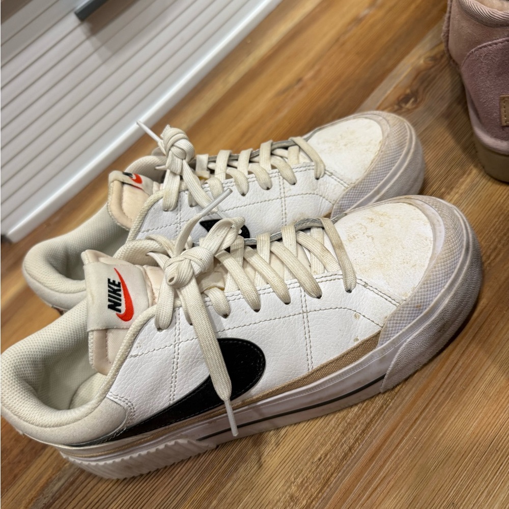 Nike Women's Cream White Sneakers with Black Swoosh